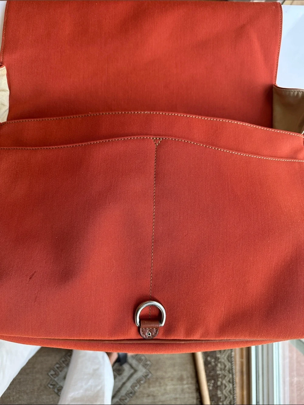 Trafalgar men’s messenger bag burnt orange with leather trim! Live New